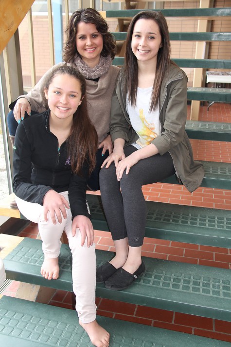 Caitlin McCormick, left, with mom Nicole McCormick who owns and operates Dance Your Hart Out studio, and Caitlin's sister Abigael. Following in their mother's footsteps, literally, both girls are dancers taking part in the Prince George Dance Festival this week. Teresa MALLAM/Free Press