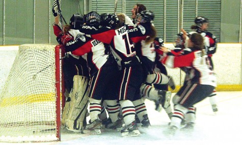 Somewhere in that group of Northern Cougars is goalie Kelsey Roberts, who backstopped them to a 1-0 win Sunday over the Fraser Valley Phantoms on Sunday afternoon at Kin 2. The win gave the Cougars the B.C. Female Midget League title, as they downed the Phantoms two games to one in the final series. The Phantom won game one 2-1 in double overtime before the Cougars tied the series with a 1-0 win in triple overtime. Allan WISHART/Free Press