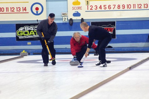 Bill Fisher comes out of the hack to release a rock during the Kelly Cup final on Sunday at the Prince George Golf and Curling Club. Fisher downed Scott Sherba to win his fourth Kelly Cup. Allan WISHART/Free Press