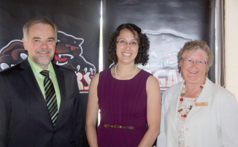 Marnie Hamagami, centre, was saying "Hello" to Andy Beesley of the Prince George Cougars and "Goodbye" to Teresa Saunders of the Prince George Symphony Orchestra on Friday. Hamagami is leaving her position as general manager of the PGSO to become the director of sales and marketing for the Cougars. Allan WISHART/Free Press