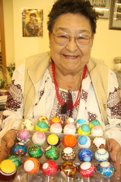 Artisan and crafter Rose-Marie Prokopchuk displays her unique Easter eggs on Sunday at St. George's Ukrainian Catholic Church Besides her traditional pysanky decorated eggs Prokopchuk paints her eggs to look like sports balls. Teresa MALLAM/Free Press