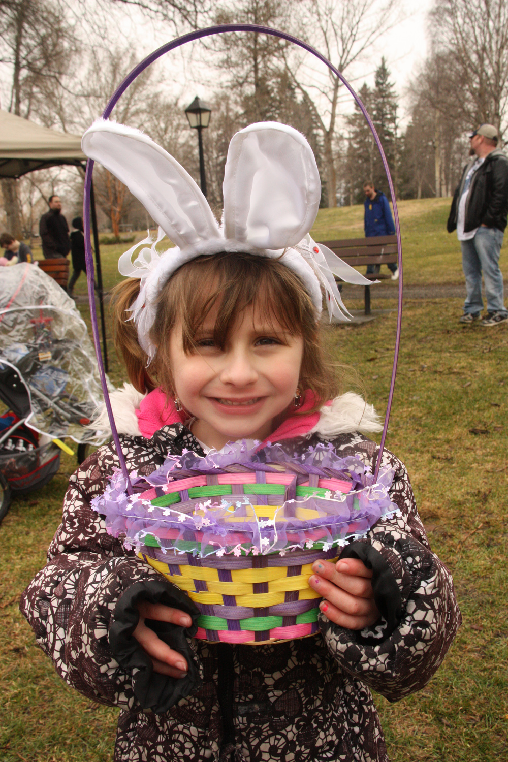Rae Giergr, 6, has her basket and bunny ears ready to find the best eggs at Saturday's Easter Egg Hunt at Fort George Park. The event included games, mascots and prizes. Teresa MALLAM/Free Press