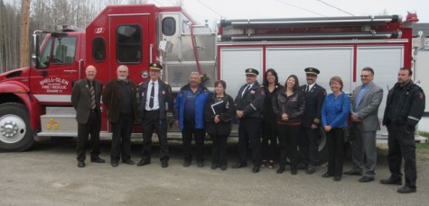 Representatives from Lheidli T’enneh, Regional District and the Shell-Glen Volunteer Fire Rescue pose in front of the fire truck at the Lheidli T’enneh Band office.
